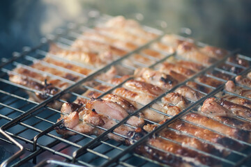 frying meat on the grill