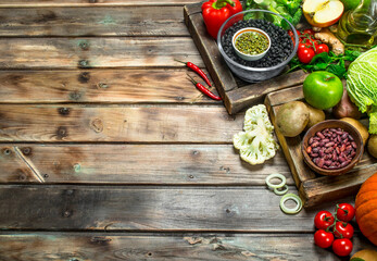 Healthy food. Healthy assortment of vegetables and fruits with legumes.