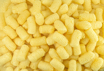 Crunchy yellow corn sticks close,top view high quality details