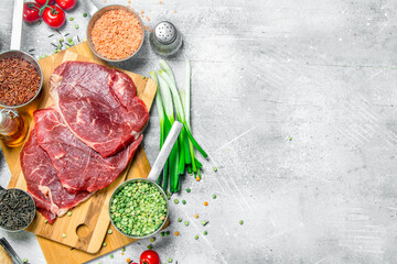 Healthy food. Raw beef meat with a variety of organic food.