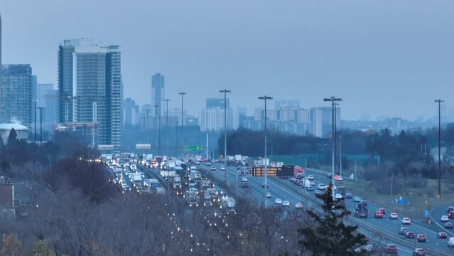 Aerial cinematic North York 401 traffic Toronto sunset 2