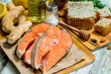 Healthy food. Salmon with honey, nuts and vegetables.