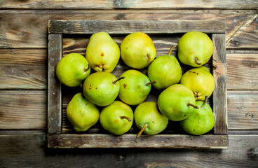 Fresh pears in the tray.