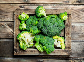 Fresh broccoli in a wooden box.