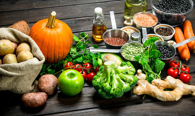 Organic food. Healthy assortment of vegetables and fruits with legumes.