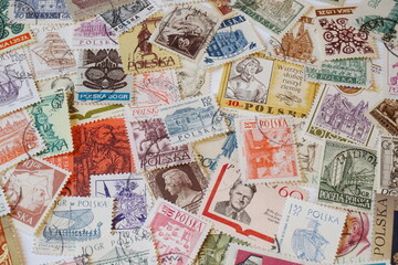 Fototapeta na wymiar Cancelled Polish Postage Stamps Wallpaper