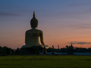 buddha statue at sunset