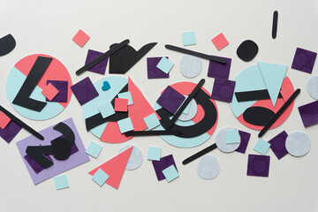 collection of various paper shapes on blank paper