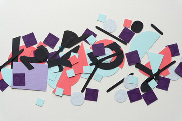 collection of various paper shapes on blank paper