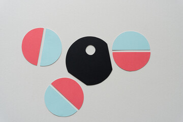 circular shapes composed of semi circle cutout shapes includes a black circle with hole and partly shaved sides