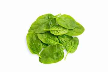 Spinach leaves on white background.