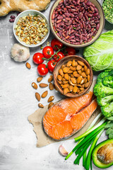 Organic food. Raw salmon fish with healthy food.