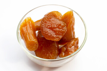 Sweet​ potato​ in syrup in glass bowl
