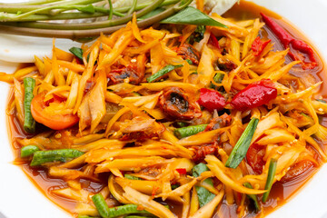 Spicy papaya salad with pickled shells
