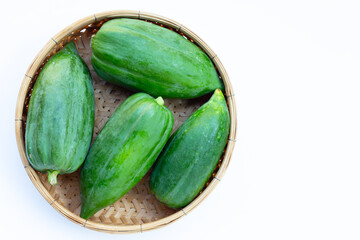 Green papaya on white background.