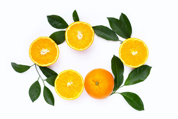 Orange fruit with green leaves on white background.