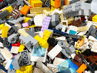 Popular toys, blocks building bricks background.
