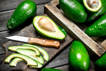 Pieces of avocado and avocado on a dressing.