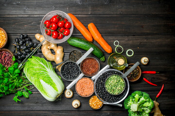 Organic food. Variety of healthy fruits and vegetables with legumes .