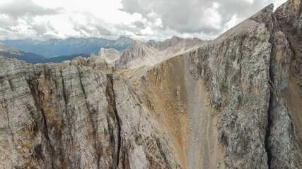 Dolomite rock wall at mountain range. Dolomites UNESCO Italian Alps landscape