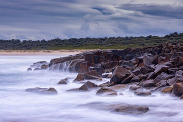 long exposure waves on rocks