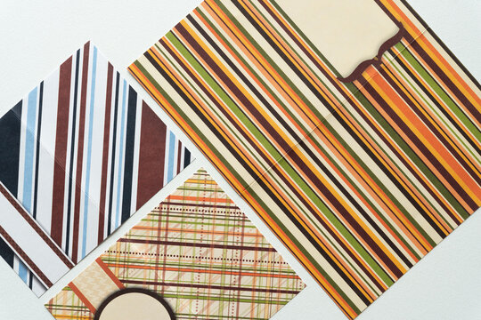set of flattened paper cards with stripes