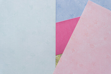 Fototapeta premium scrapbook or crafting paper background mostly in pink and blue