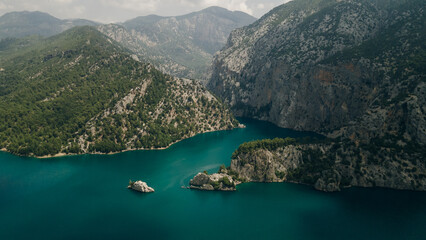 Fototapeta na wymiar Dam lake in Green Canyon. Beatiful View to Taurus Mountains and turquoise water. turkey