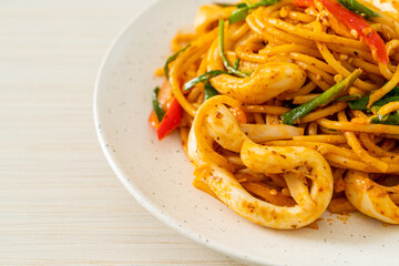 stir-fried spaghetti with salted egg and squid