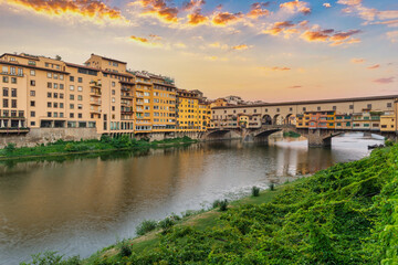 Florence Italy, sunset city skyline at Ponte Vecchio Bridge and Arno River, Tuscany Italy