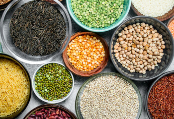 Organic food. Assortment of legumes in bowls .