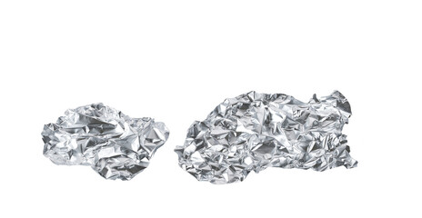 Small pieces of crumpled aluminum foils isolated on a white background.White shiny aluminum foil...