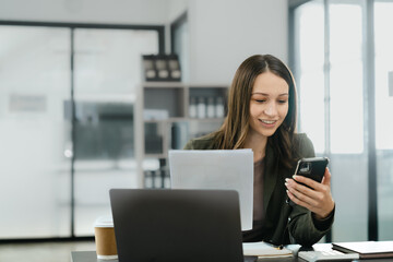 Attractive caucasian business woman top manager working with laptop tablet cojmputer planning...