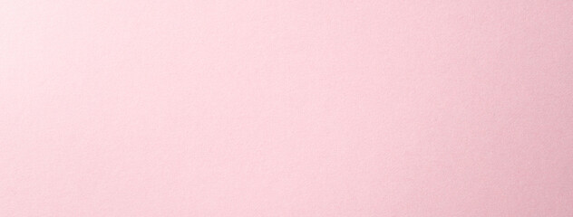 質感のあるピンク色の紙の背景テクスチャー