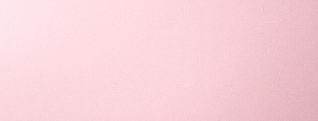 質感のあるピンク色の紙の背景テクスチャー