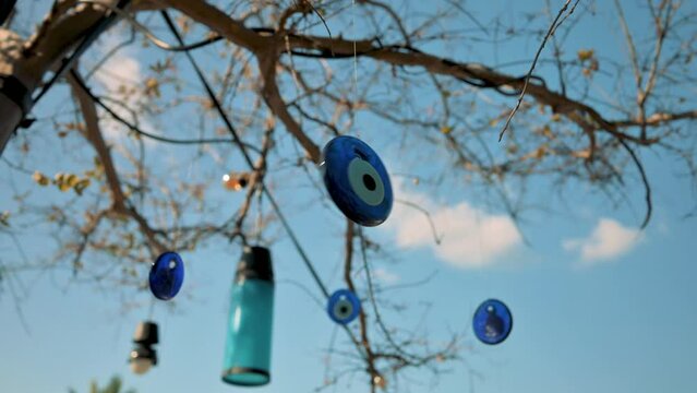 Traditional turkish amulet the Eye of Fatima spinning in the wind. 4k video footage