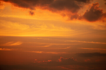 Colorful clouds at sunset as background.