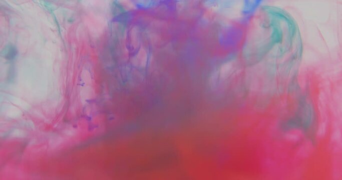 4K footage ,Color paint drops in water ,abstract color mix ,drop of Ink color mix paint falling on water Color ink in water ,Ink splash swirling underwater isolated ,Paint water drop ,Color ink splash