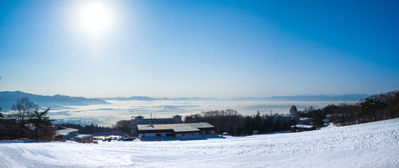Quiet ski slope and cloudseas formed by temperature inversion below (Inawashiro, Fukushima, Japan)
