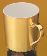 golden colour coffee cup, tea cup