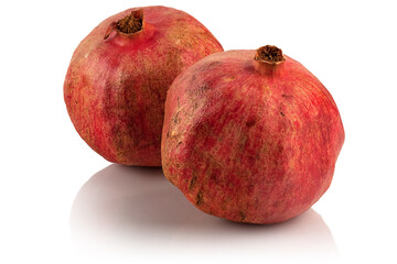 Two ripe, juicy pomegranates