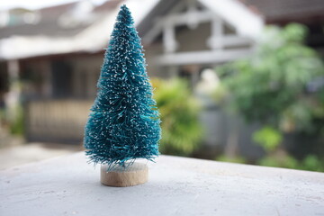 Miniature christmas tree with snow.