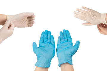 Woman puts on blue rubber gloves.
