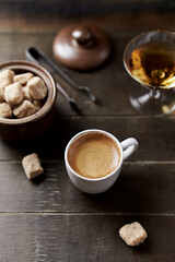 Cup of coffee on rustic wooden background. Copy space.