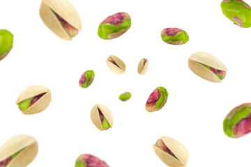 Falling pistachio isolated on white background, selective focus