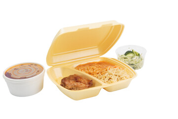 Chicken and pasta in a plastic box for delivery.