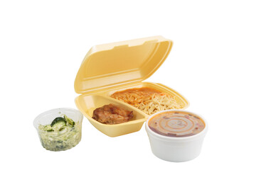 Chicken and pasta in a plastic box for delivery.