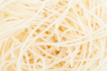 Intricate patterns of boiled noodles.