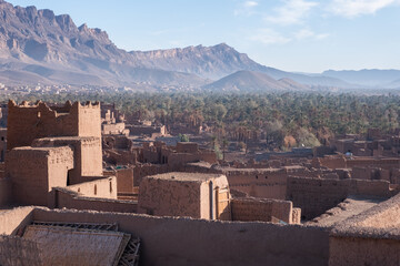Fototapeta na wymiar Traditional Berber village nestled in the foothills of the Atlas Mountains,