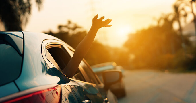 Hatchback Car Travel Driving Road Trip Of Woman Summer Vacation In Blue Car At Sunset,Girls Happy Traveling Enjoy Holidays And Relaxation With Friends Together Get The Atmosphere And Go To Destination